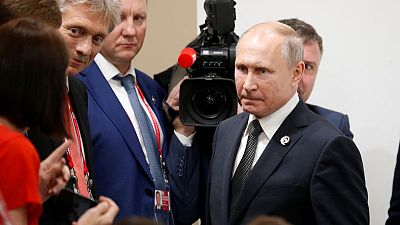 Putin says Russia will do all it can to improve ties with U.S. Putin says Russia will do all it can to improve ties with U.S.