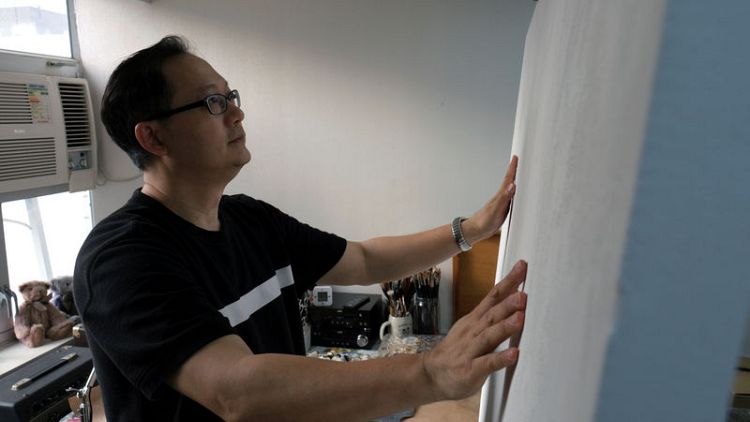 Hong Kong artist wields a paintbrush at Hong Kong mass protests