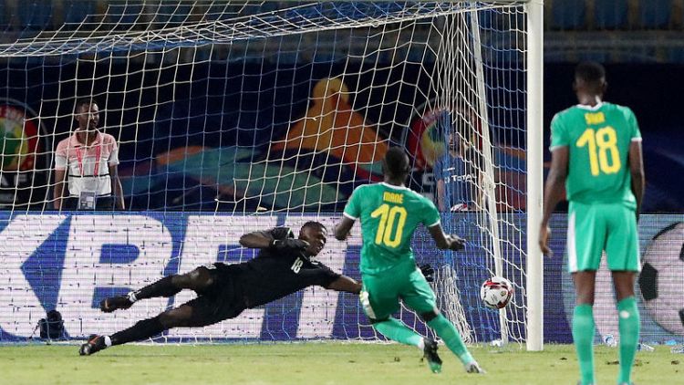 Mane misses penalty, scores twice as Senegal win and qualify