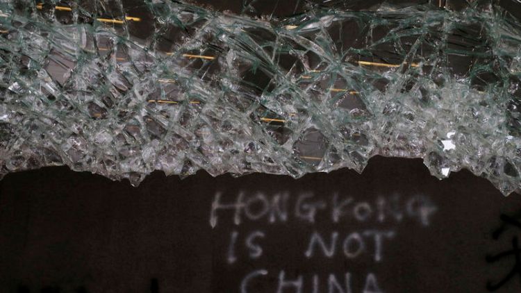 Calm falls on Hong Kong after protests erupt into extraordinary violence