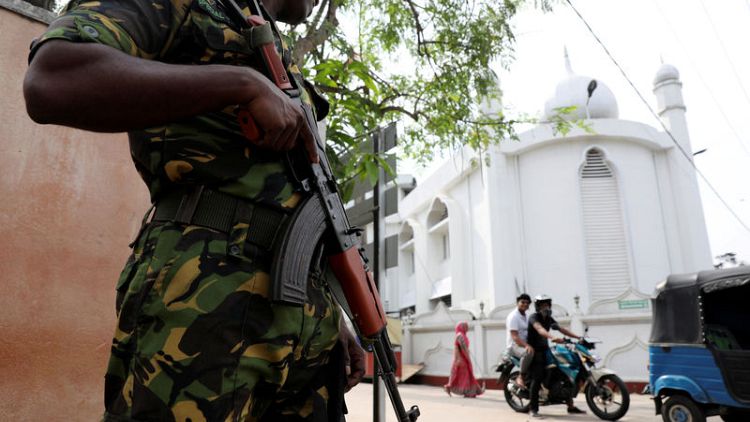 Sri Lanka police chief, ex-defence secretary arrested over bombings