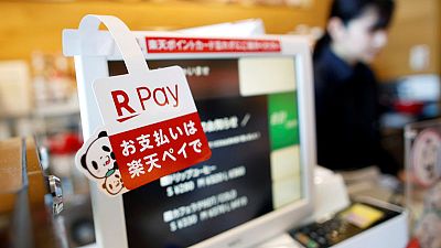 Hoping to boost spending, Japan tries to sell shoppers on cashless purchases Hoping to boost spending, Japan tries to sell shoppers on cashless purchases