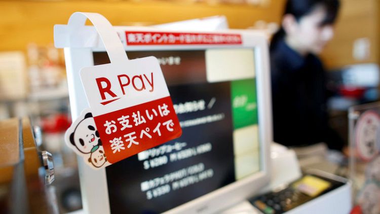 Hoping to boost spending, Japan tries to sell shoppers on cashless purchases