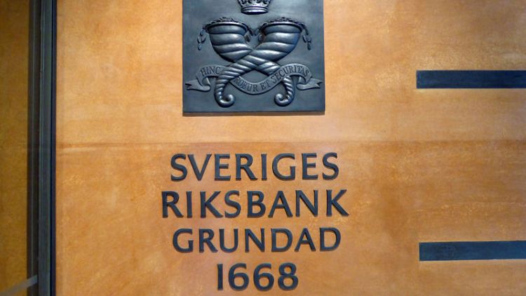 Swedish central bank holds rates and forecast, but signals risks abroad