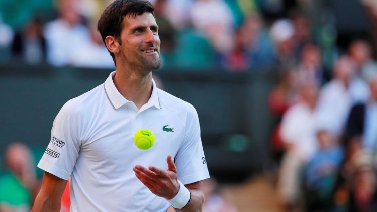 Regular as clockwork, Djokovic eases into Wimbledon third round