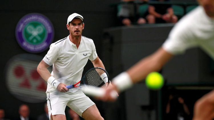 Murray makes winning doubles return as Brits march on