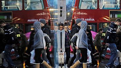 UK economy shows slowdown signs as recruiters, shoppers turn wary UK economy shows slowdown signs as recruiters, shoppers turn wary