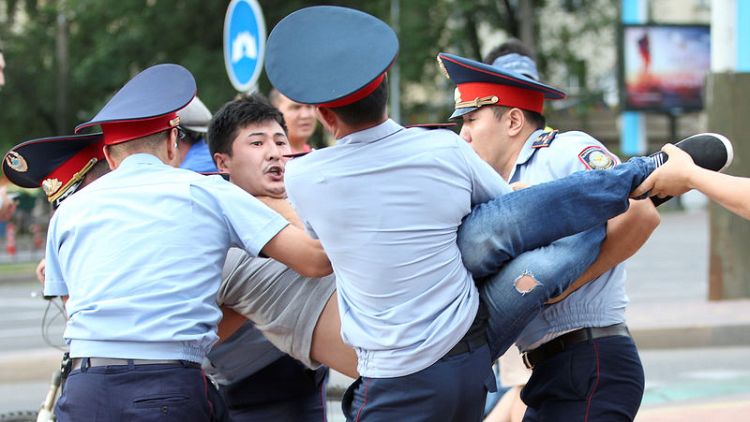 Dozens of protesters arrested at rallies on Kazakh leader's birthday