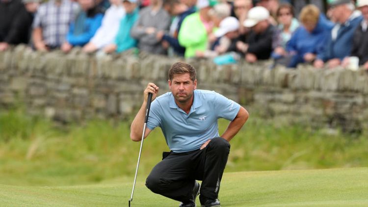 England's Rock grabs Irish Open lead with record round of 60