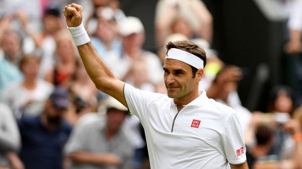 Federer bags more records as he downs Pouille to reach last 16 Federer bags more records as he downs Pouille to reach last 16