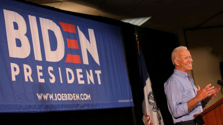 Democratic candidates court black voters; Biden addresses race criticism