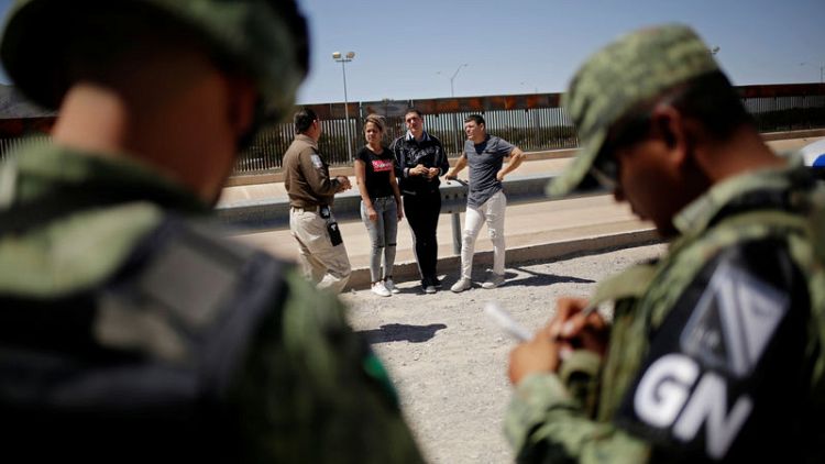 Mexico's new National Guard was created to fight crime, but now it's in a face-off with migrants