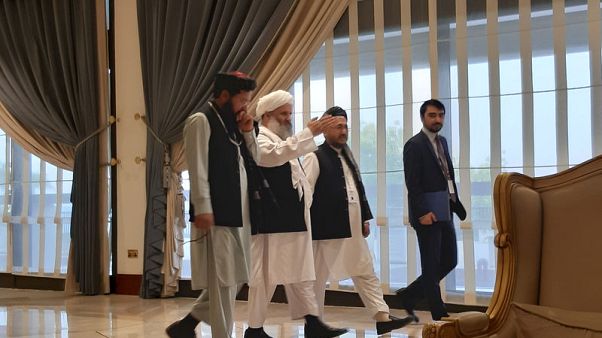 Afghans, Taliban talk in Qatar about peace as war rages at home Afghans, Taliban talk in Qatar about peace as war rages at home