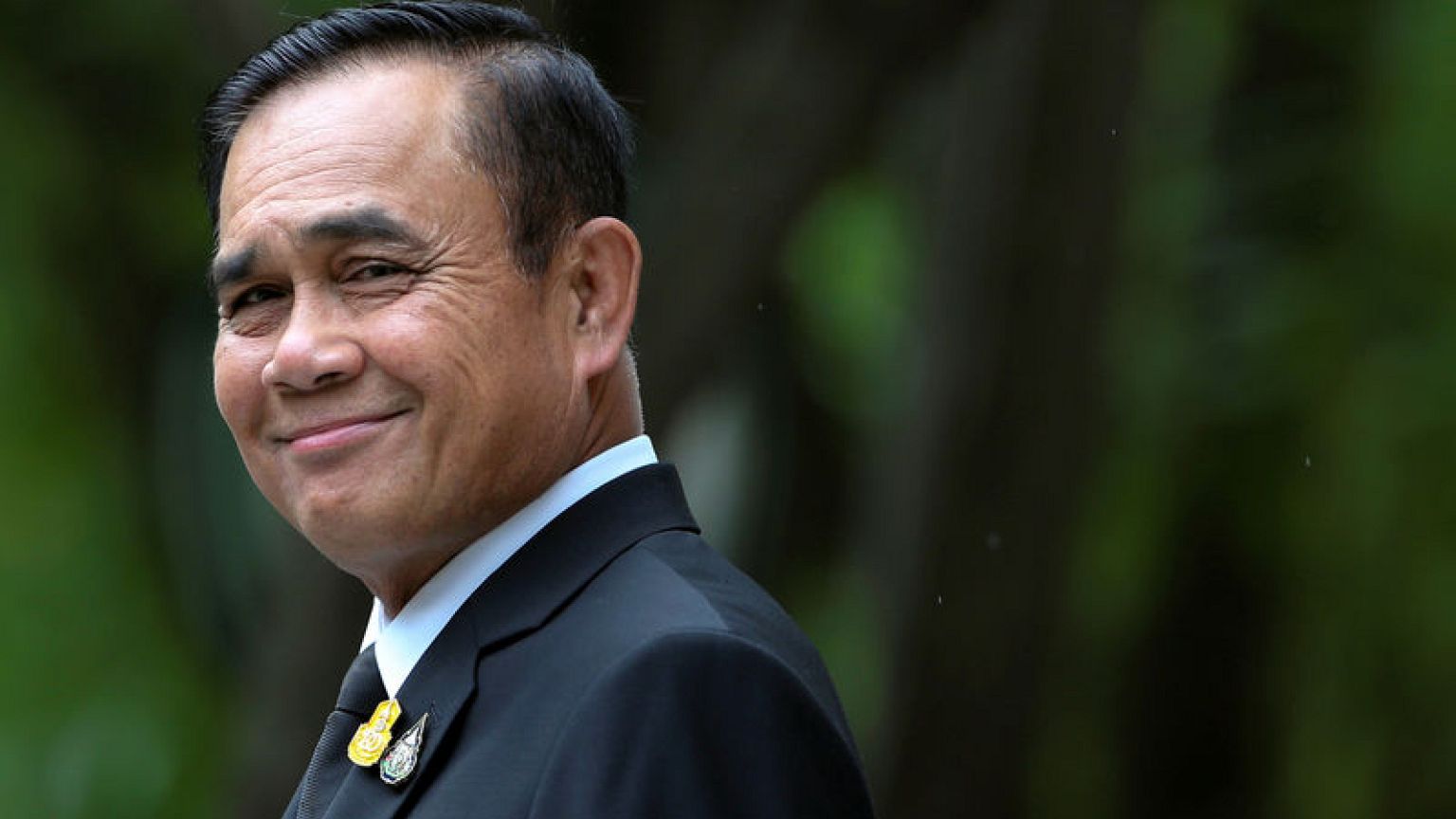 Thai junta leader orders end to army rule but keeps tough powers
