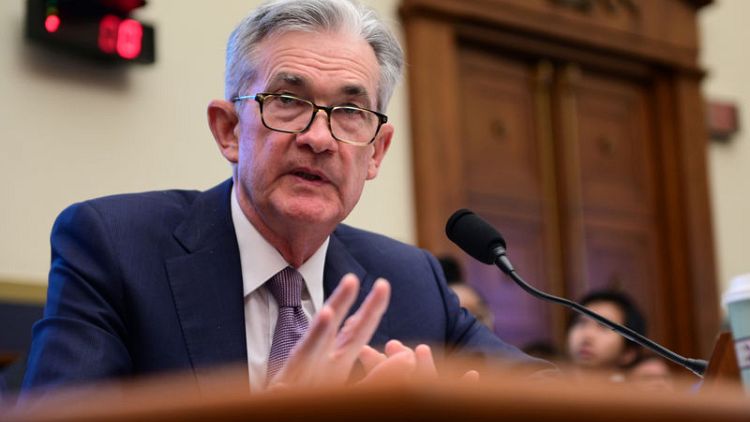 Fed's Powell bolsters rate cut view on trade, global growth concerns