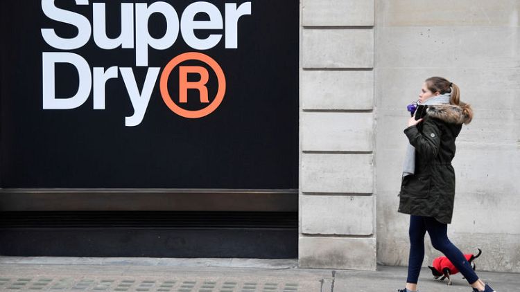 Returning Superdry founder slashes value of stores by £130 million