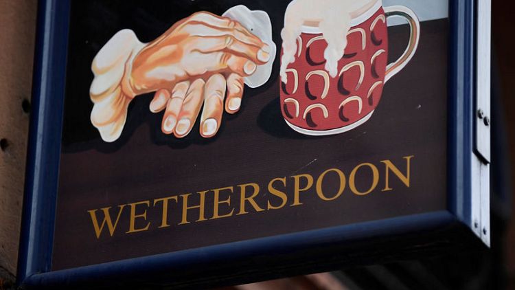J D Wetherspoon comparable sales rise, but sees higher debt