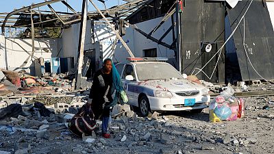 Bombed Tripoli migrant detention centre being emptied - U.N. Bombed Tripoli migrant detention centre being emptied - U.N.
