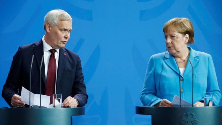 Merkel seen shaking for third time in weeks - Reuters TV