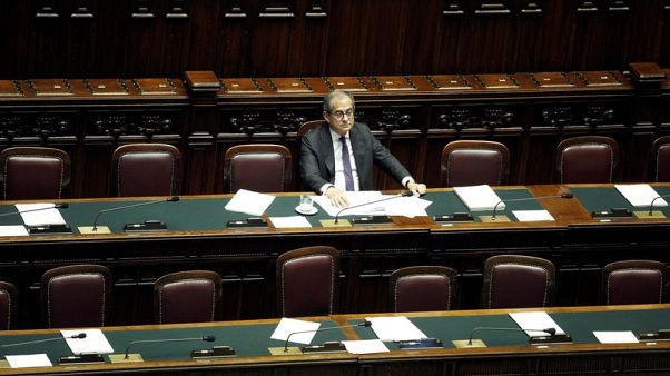 Italy committed to issuing dollar bond this year - debt management chief Italy committed to issuing dollar bond this year - debt management chief