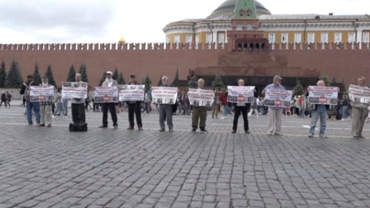 Russian police detain Crimean Tatar protesters on Moscow's Red Square