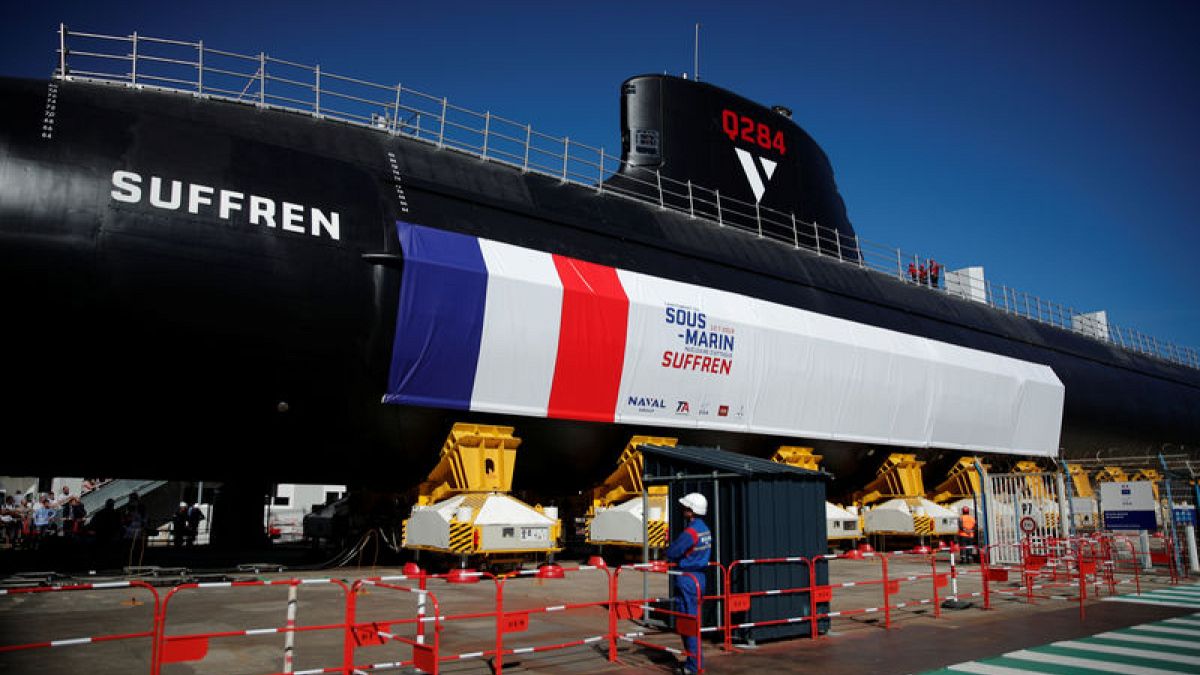 French President Emmanuel Macron unveils France's nuclear-powered 'Barracuda' submarine