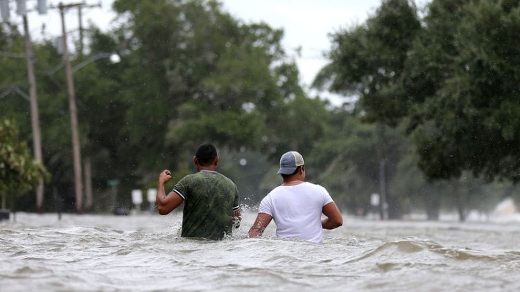 Barry drenches Louisiana after weakening to tropical storm