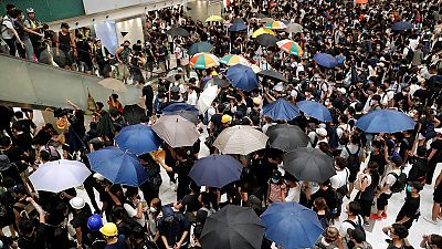 Clashes break out as Hong Kong protesters escalate fight in suburbs Clashes break out as Hong Kong protesters escalate fight in suburbs