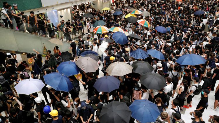 Clashes break out as Hong Kong protesters escalate fight in suburbs