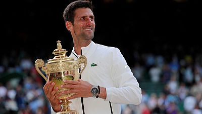 Djokovic beats Federer in Wimbledon epic to win fifth title Djokovic beats Federer in Wimbledon epic to win fifth title