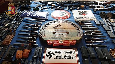 Italy seizes air-to-air missile, guns in raids on neo-Nazis Italy seizes air-to-air missile, guns in raids on neo-Nazis