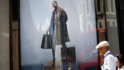 Demand for new designer's ranges lift Burberry sales and shares