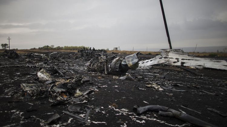Ukraine says driver of missile that shot down plane has been held for two years