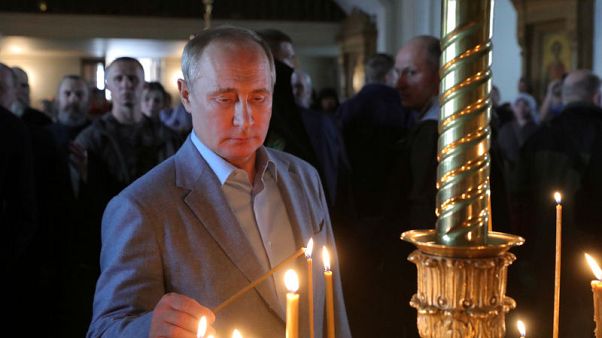 Russia's Putin extends passport offer to Ukraine citizens Russia's Putin extends passport offer to Ukraine citizens