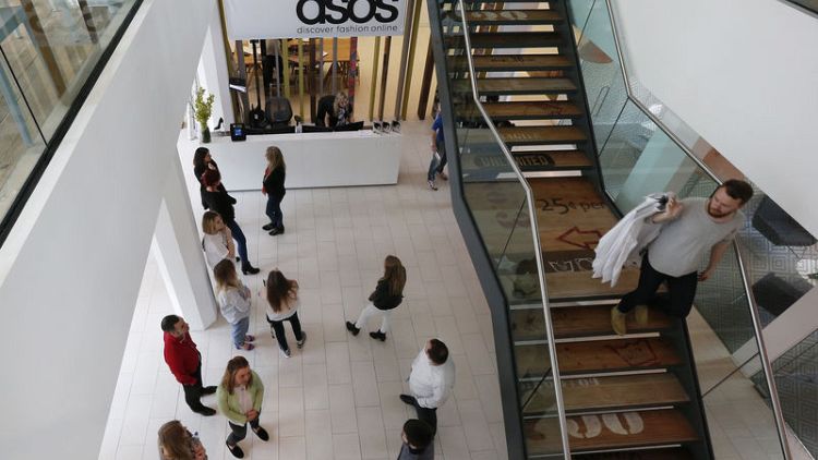 ASOS warns on profit again, blames overseas warehouse problems