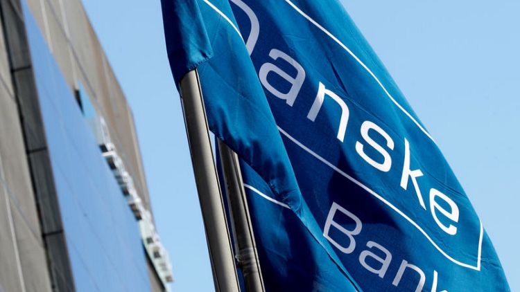 Danske Bank second quarter pre-tax profit hit by costs, low interest rates
