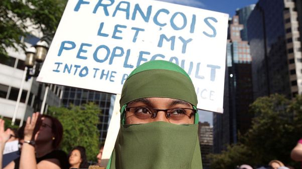 Court rejects bid to suspend part of Canadian province's religious symbols ban Court rejects bid to suspend part of Canadian province's religious symbols ban