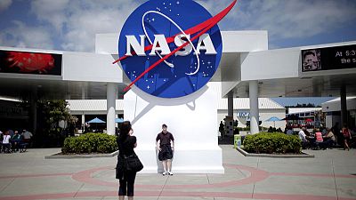 Explainer: NASA aims to build on moon as a way station for Mars Explainer: NASA aims to build on moon as a way station for Mars