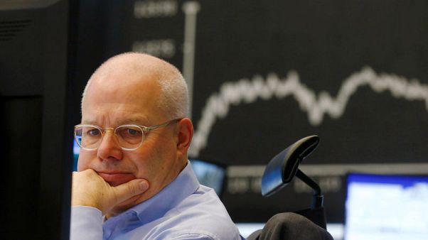 Fed signals buoy European shares, InBev jumps Fed signals buoy European shares, InBev jumps