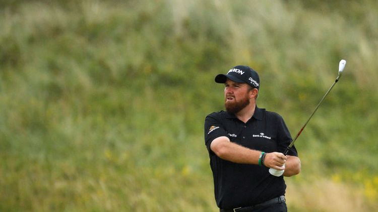 Holmes consolidates lead, Lowry on the charge