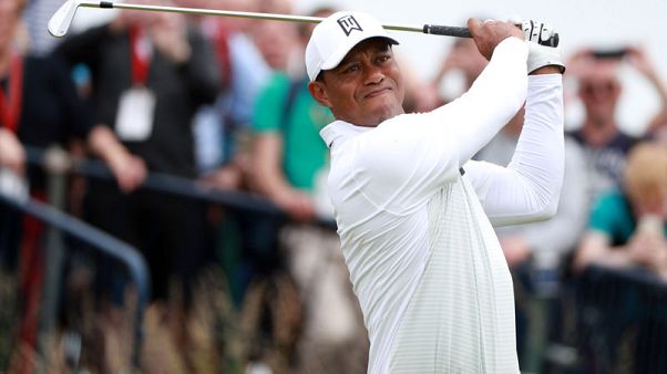 Woods to miss cut despite improved round Woods to miss cut despite improved round