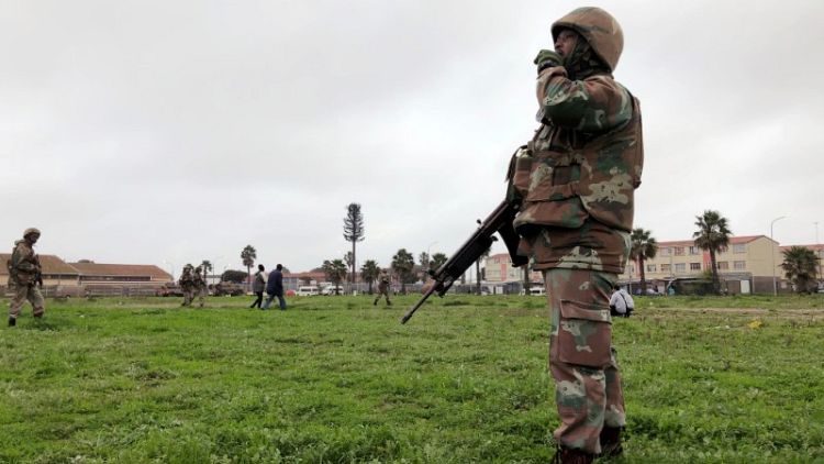 Far from Cape Town tourist sites, a gangland battle rages