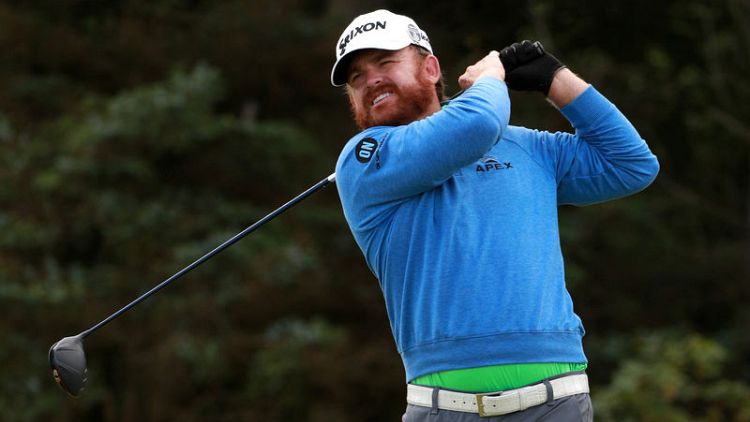 Holmes and Lowry share lead as Fleetwood and Westwood push