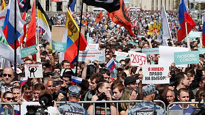 Thousands protest in Moscow after opposition barred from city vote Thousands protest in Moscow after opposition barred from city vote