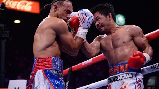 Pacquiao beats Thurman on split decision Pacquiao beats Thurman on split decision