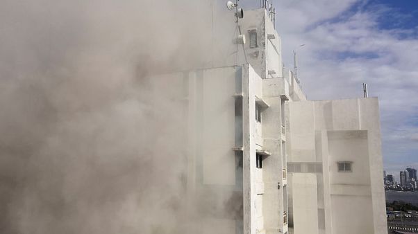 Many feared trapped in major fire in India's financial capital Many feared trapped in major fire in India's financial capital