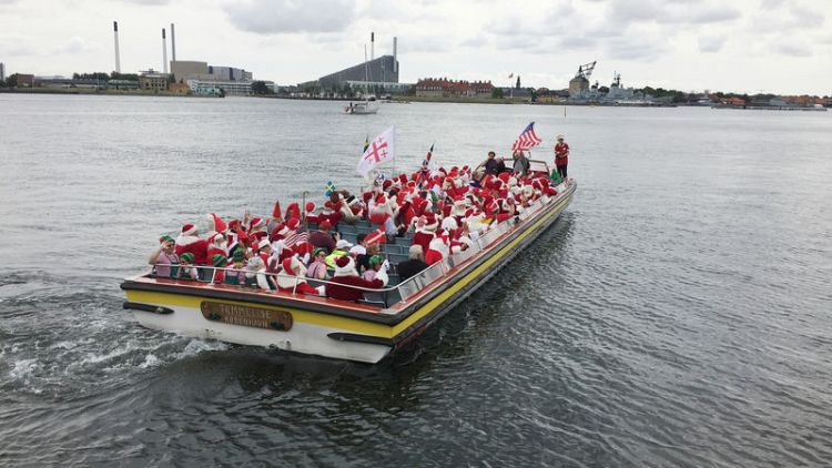 Summertime, and the living is easy for Santas in Copenhagen
