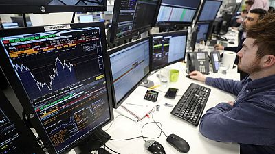 FTSE 100 up on global rate cut hopes, weak data hits supermarkets
