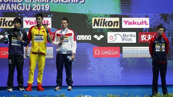 Sun embroiled in more podium controversy at worlds Sun embroiled in more podium controversy at worlds
