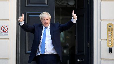 Johnson to take helm of economy as warning signs flash